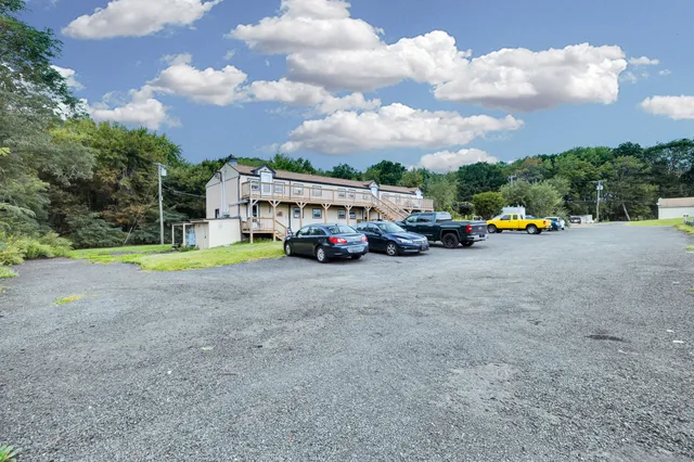 a car parked in front of a house
