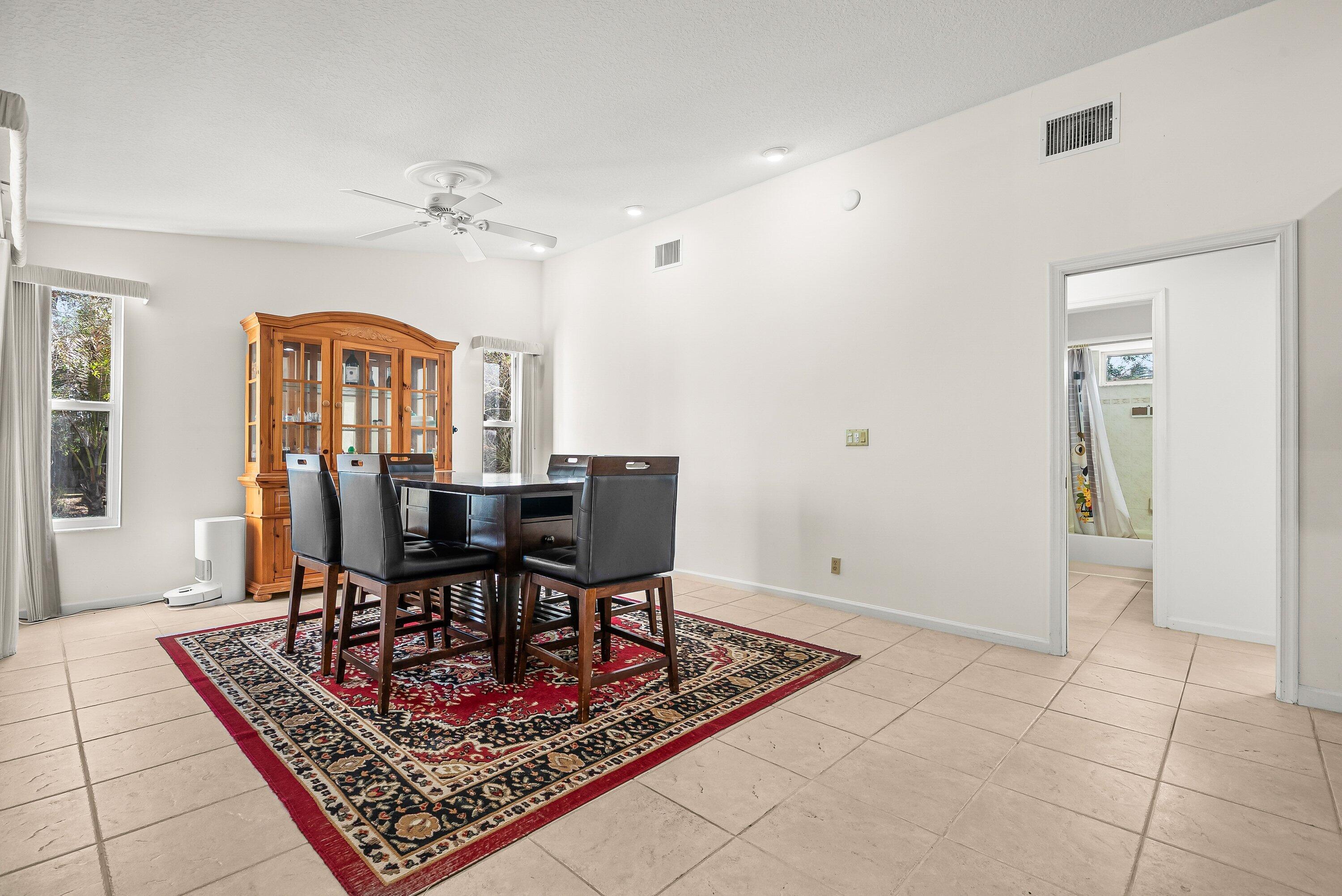 18098 93rd Road North The Acreage, FL 33470 - Photo 11 of 60 a view of a livingroom with furniture