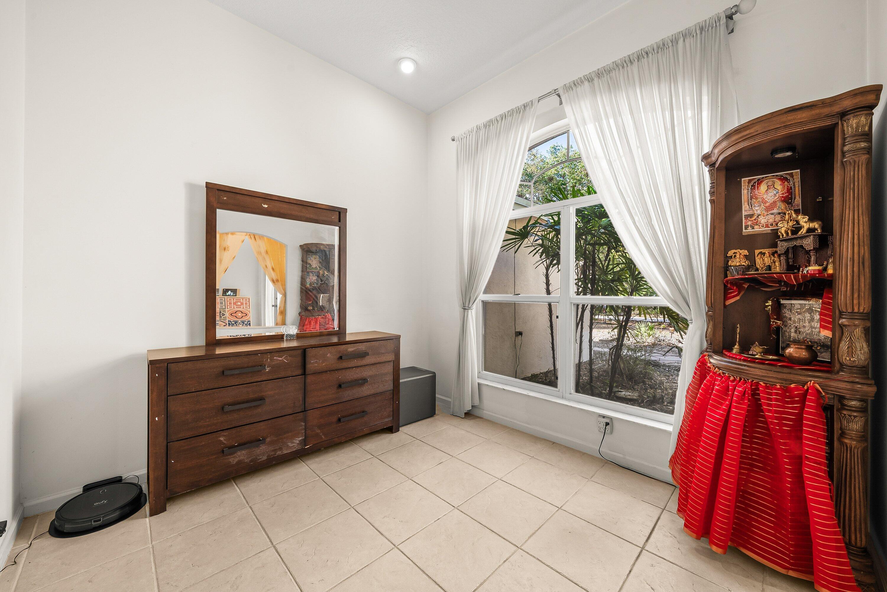 18098 93rd Road North The Acreage, FL 33470 - Photo 20 of 60 a view of front door and bedroom