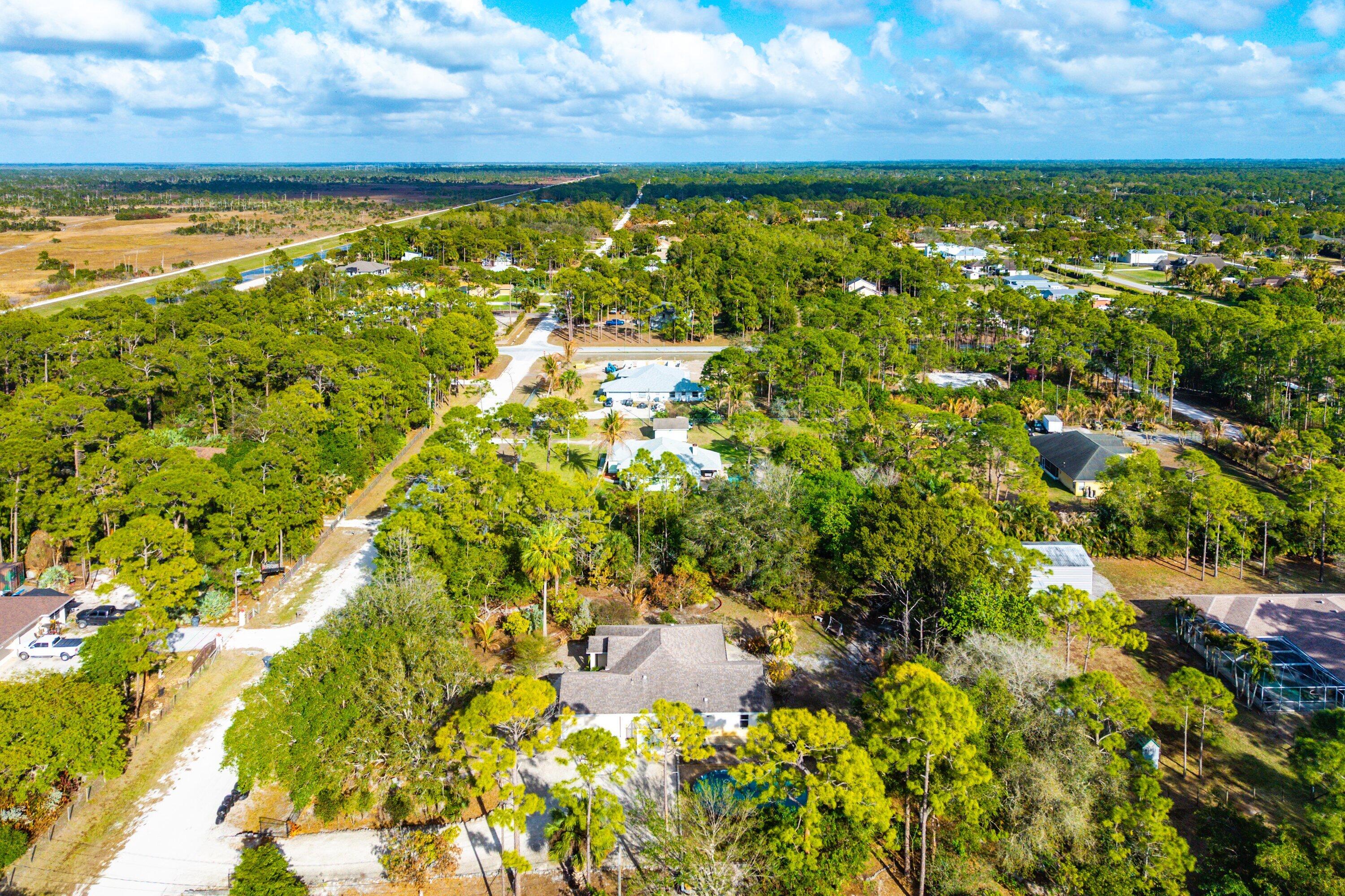 18098 93rd Road North The Acreage, FL 33470 - Photo 48 of 60 a view of a yard of a lake