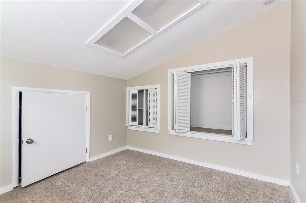 3211 Timberline Road Winter Haven, FL 33880 - Photo 9 of 15 an empty room with windows and closet