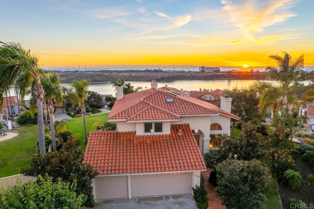 4565 Sea Bluff Circle Carlsbad, CA 92008 - Photo 1 of 62 a view of a house with a yard from a patio