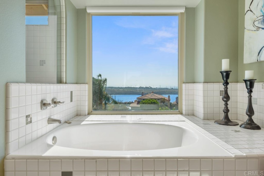 4565 Sea Bluff Circle Carlsbad, CA 92008 - Photo 34 of 62 a bathroom with a bathtub and a sink