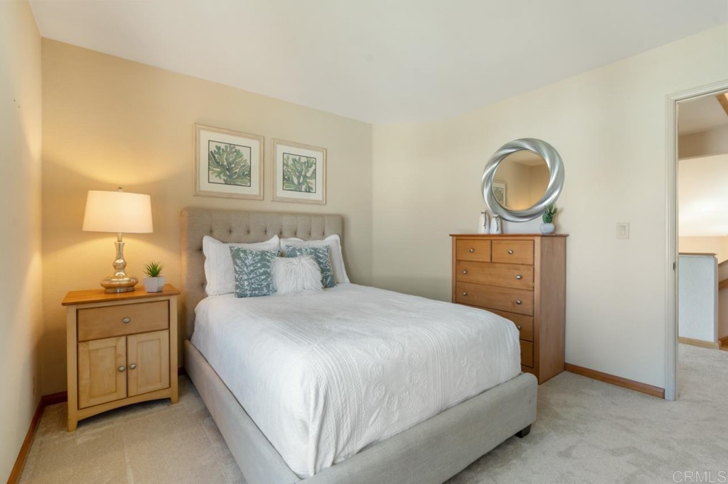 4565 Sea Bluff Circle Carlsbad, CA 92008 - Photo 38 of 62 a bedroom with a bed and a closet