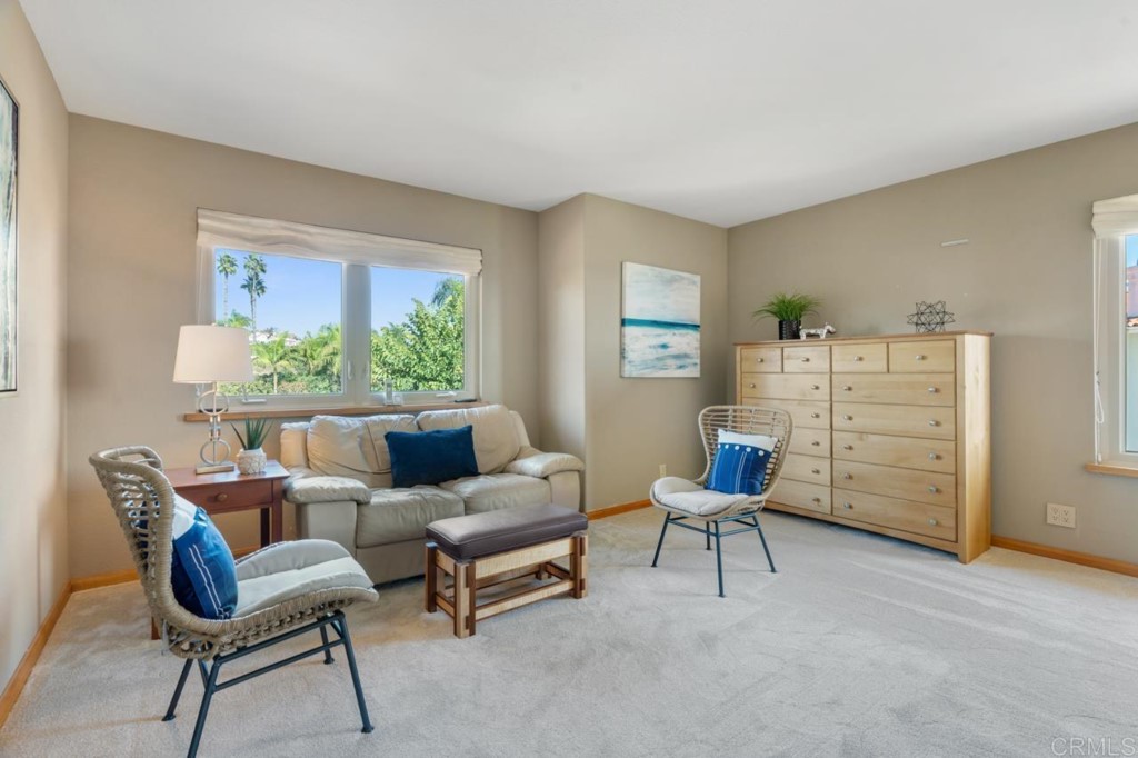 4565 Sea Bluff Circle Carlsbad, CA 92008 - Photo 40 of 62 a living room with furniture and a bed