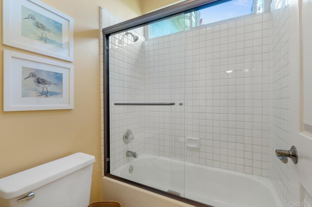 4565 Sea Bluff Circle Carlsbad, CA 92008 - Photo 46 of 62 a bathroom with a shower and a toilet