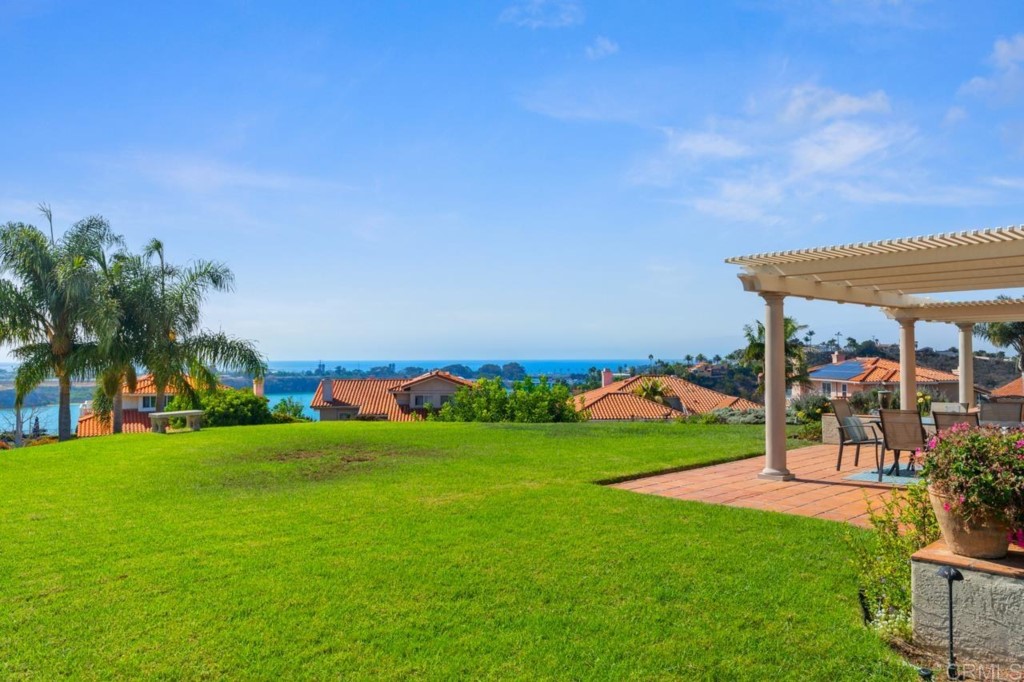 4565 Sea Bluff Circle Carlsbad, CA 92008 - Photo 50 of 62 a view of yard with swimming pool and green space
