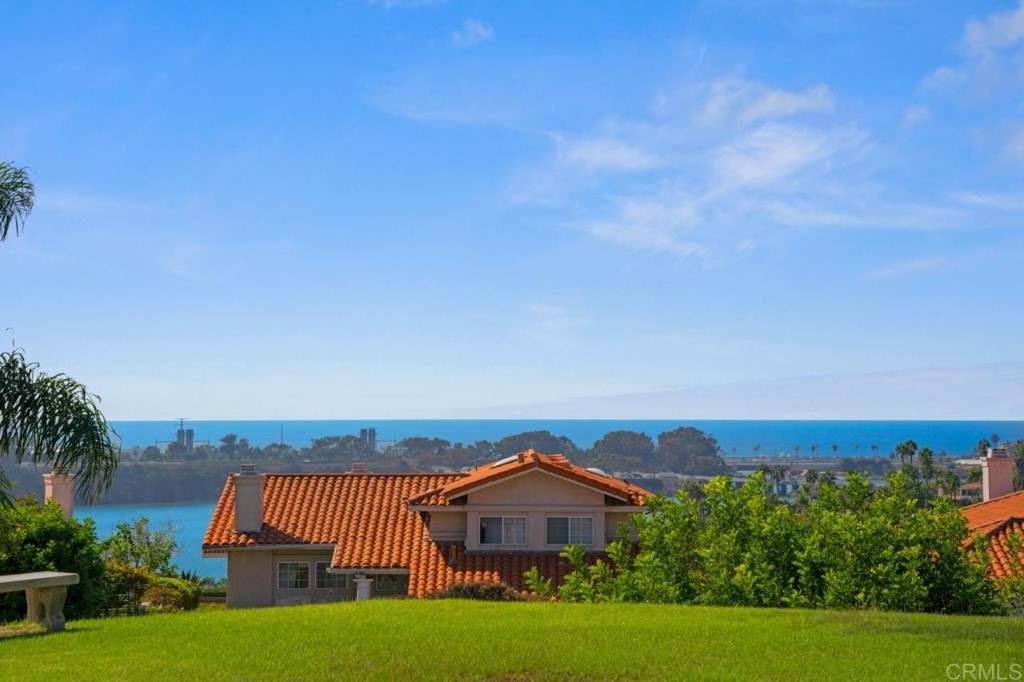 4565 Sea Bluff Circle Carlsbad, CA 92008 - Photo 52 of 62 a view of a city and a mountain in the background
