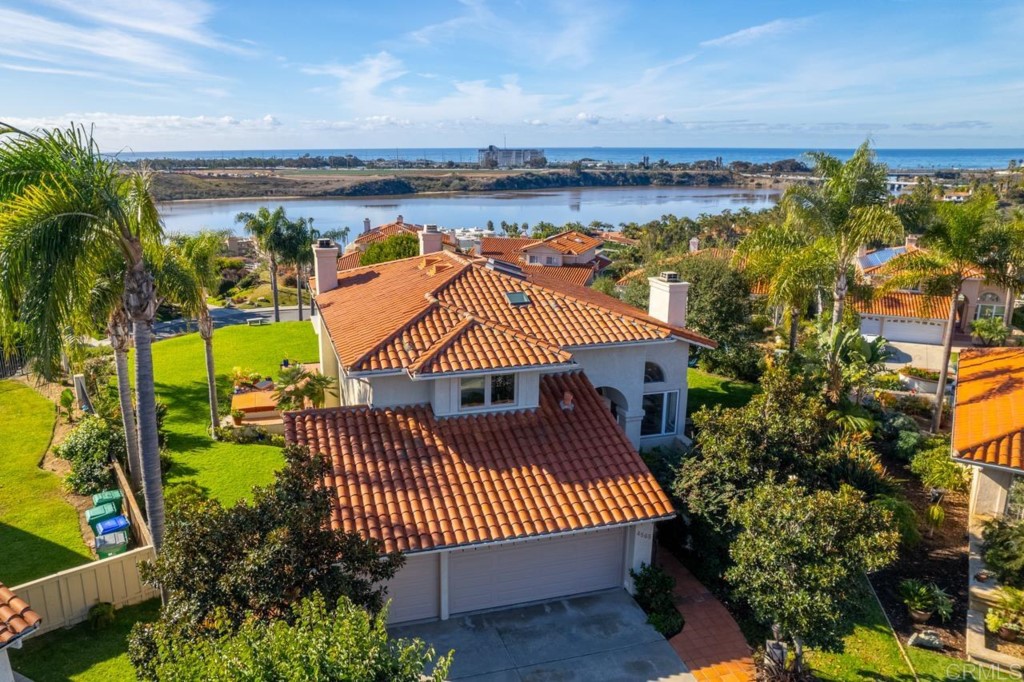 4565 Sea Bluff Circle Carlsbad, CA 92008 - Photo 55 of 62 a view of a house with a yard patio and furniture