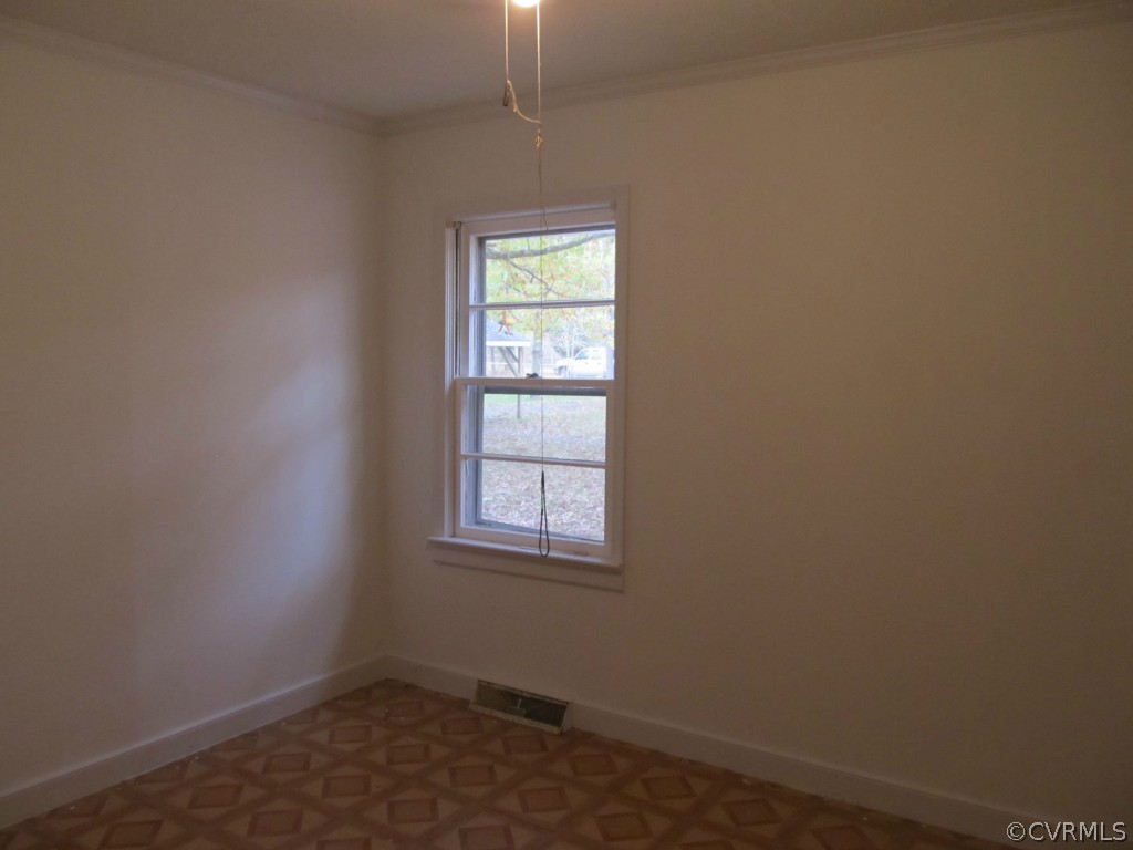 9011 Beach Road Chesterfield, VA 23838 - Photo 13 of 16 an empty room with a window