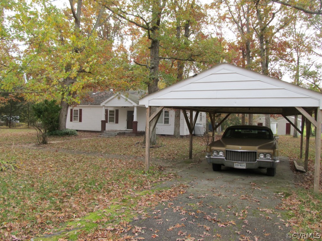 9011 Beach Road Chesterfield, VA 23838 - Photo 2 of 16 a car parked in front of a house