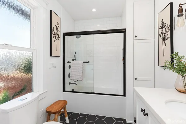 a view of a livingroom with wooden floor and closet