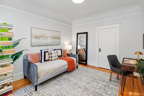 a bedroom with furniture and a bed