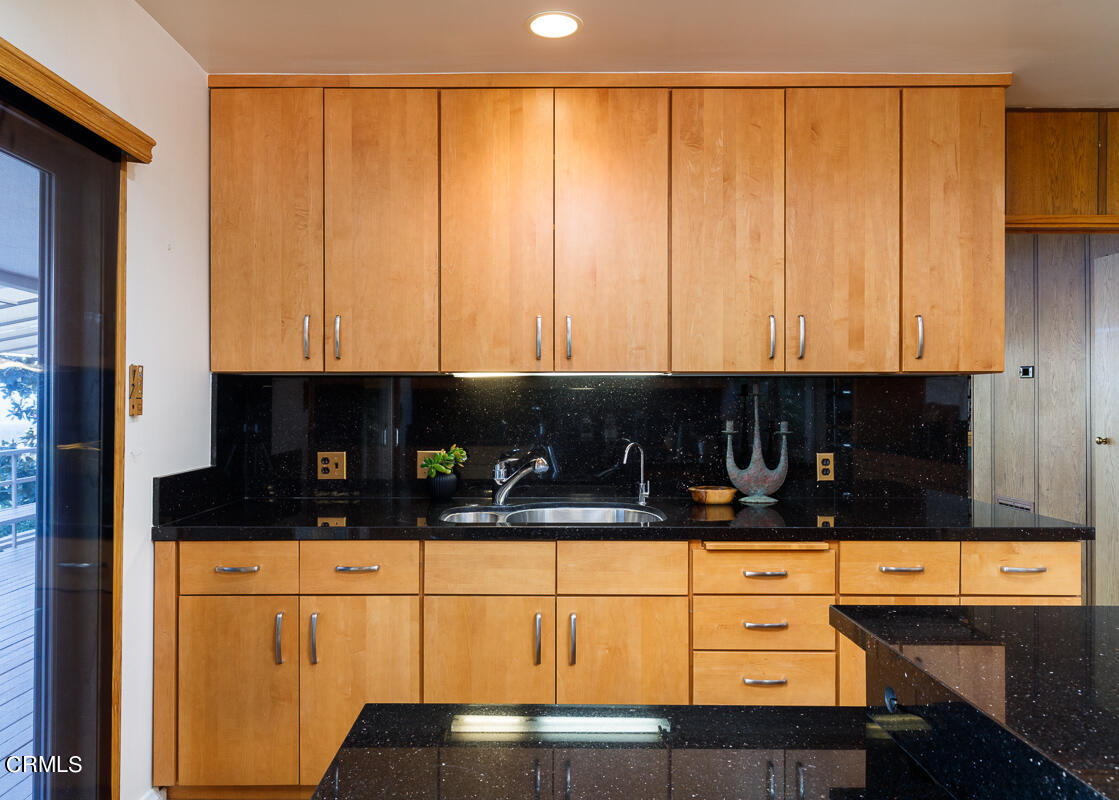 775 Panorama Place Pasadena, CA 91105 - Photo 18 of 62 a kitchen with a sink and cabinets