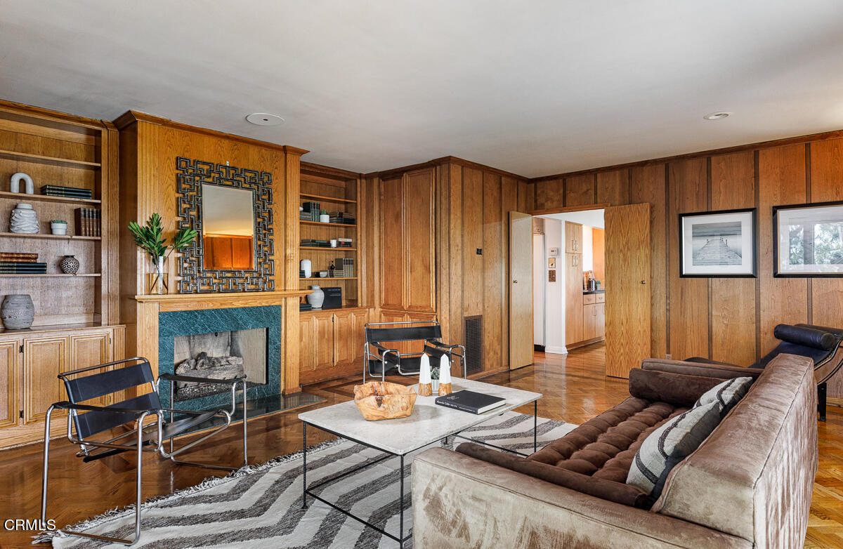 775 Panorama Place Pasadena, CA 91105 - Photo 23 of 62 a living room with furniture and a fireplace