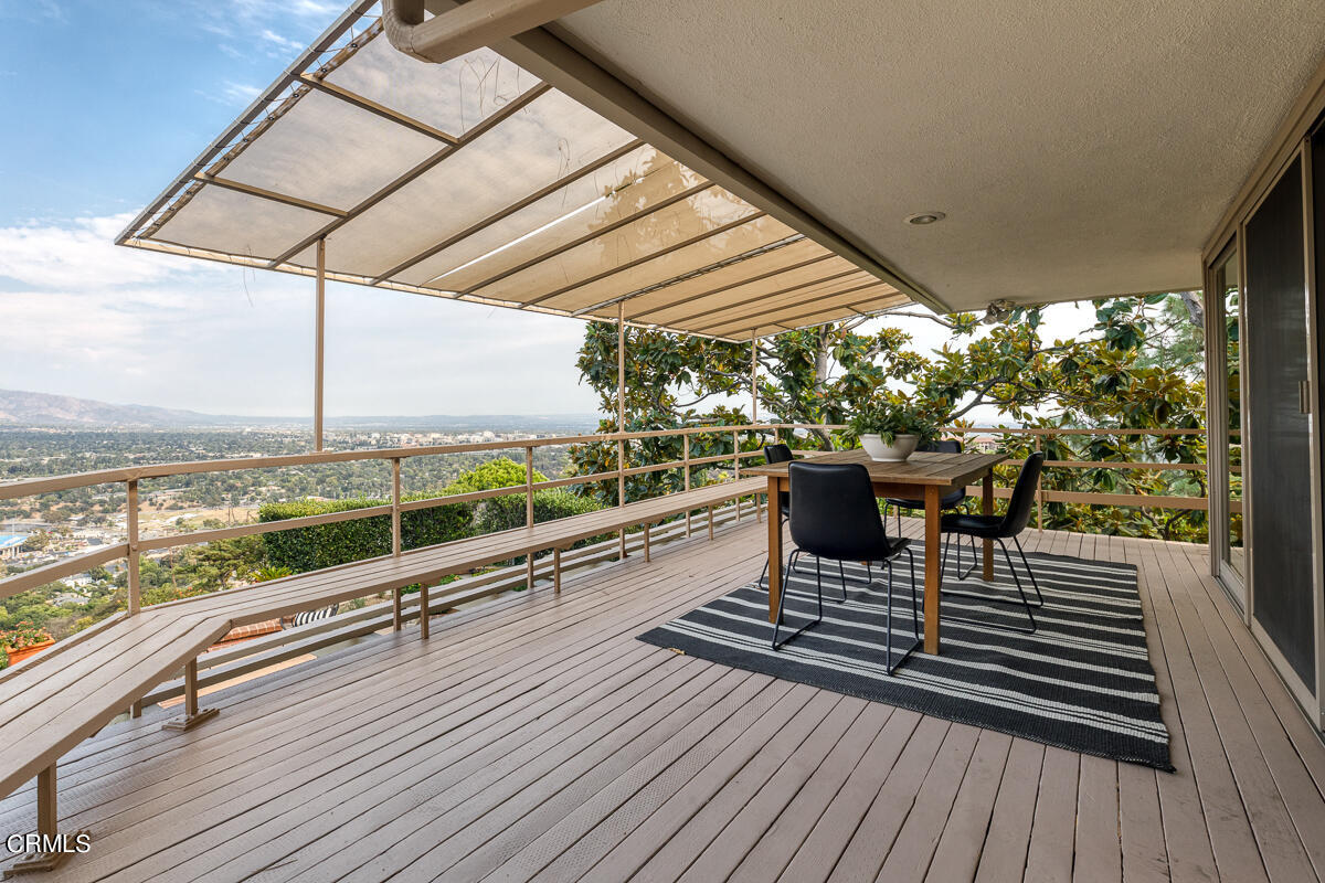 775 Panorama Place Pasadena, CA 91105 - Photo 26 of 62 a roof deck with a table and chairs