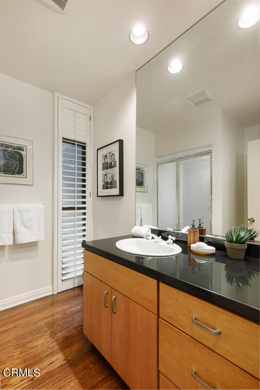 775 Panorama Place Pasadena, CA 91105 - Photo 28 of 62 a spacious bathroom with double vanity sinks a mirror and a shower