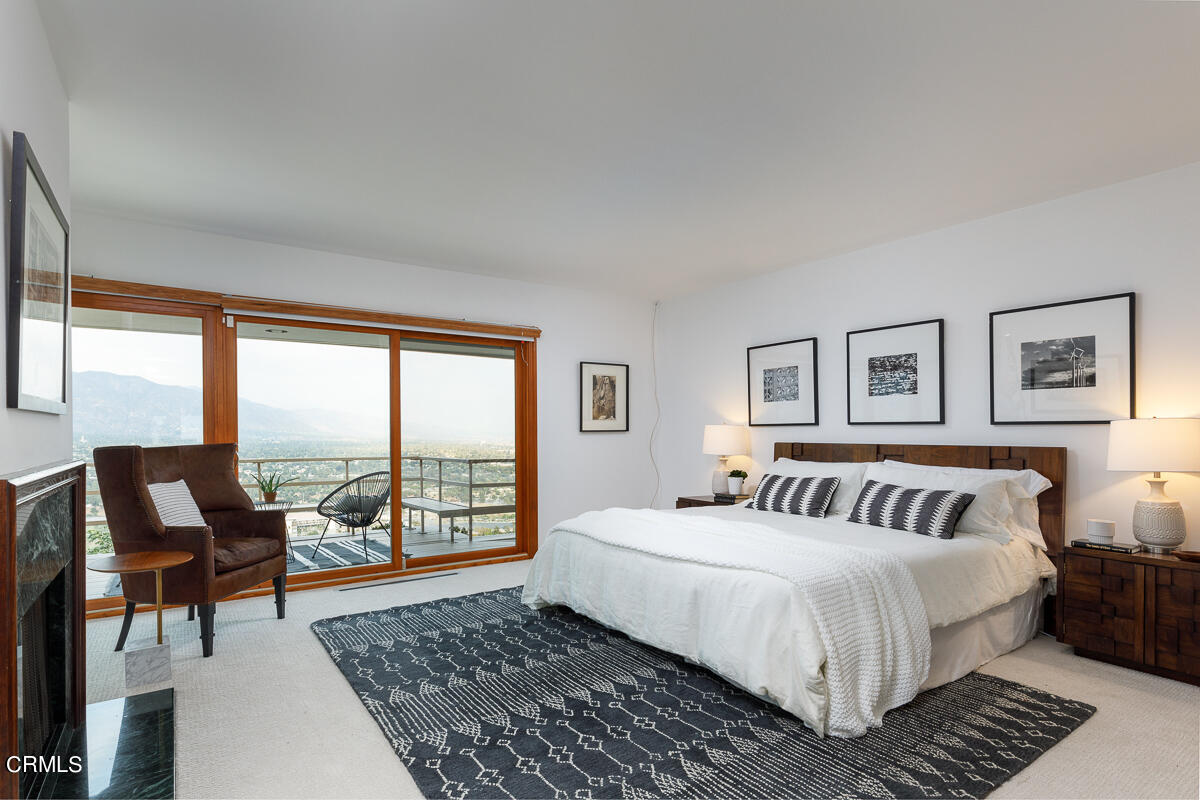 775 Panorama Place Pasadena, CA 91105 - Photo 29 of 62 a bedroom with a large bed and a couch