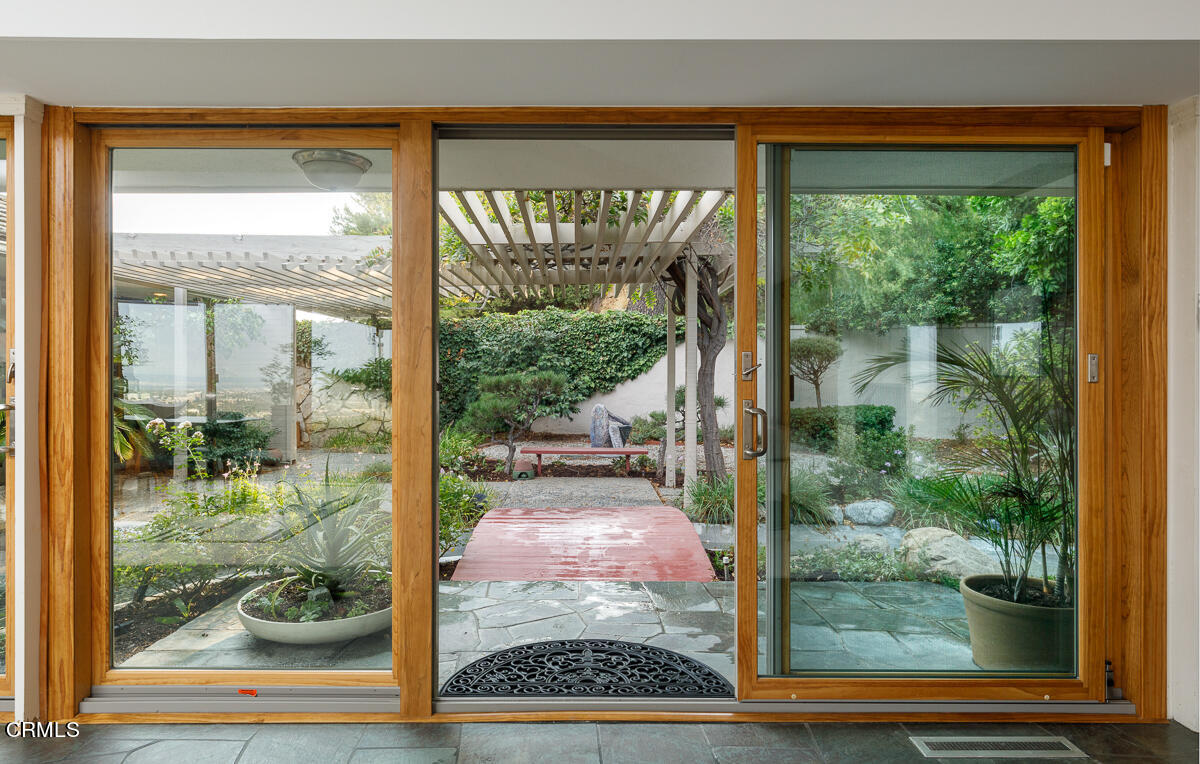 775 Panorama Place Pasadena, CA 91105 - Photo 5 of 62 a view of a glass door and porch