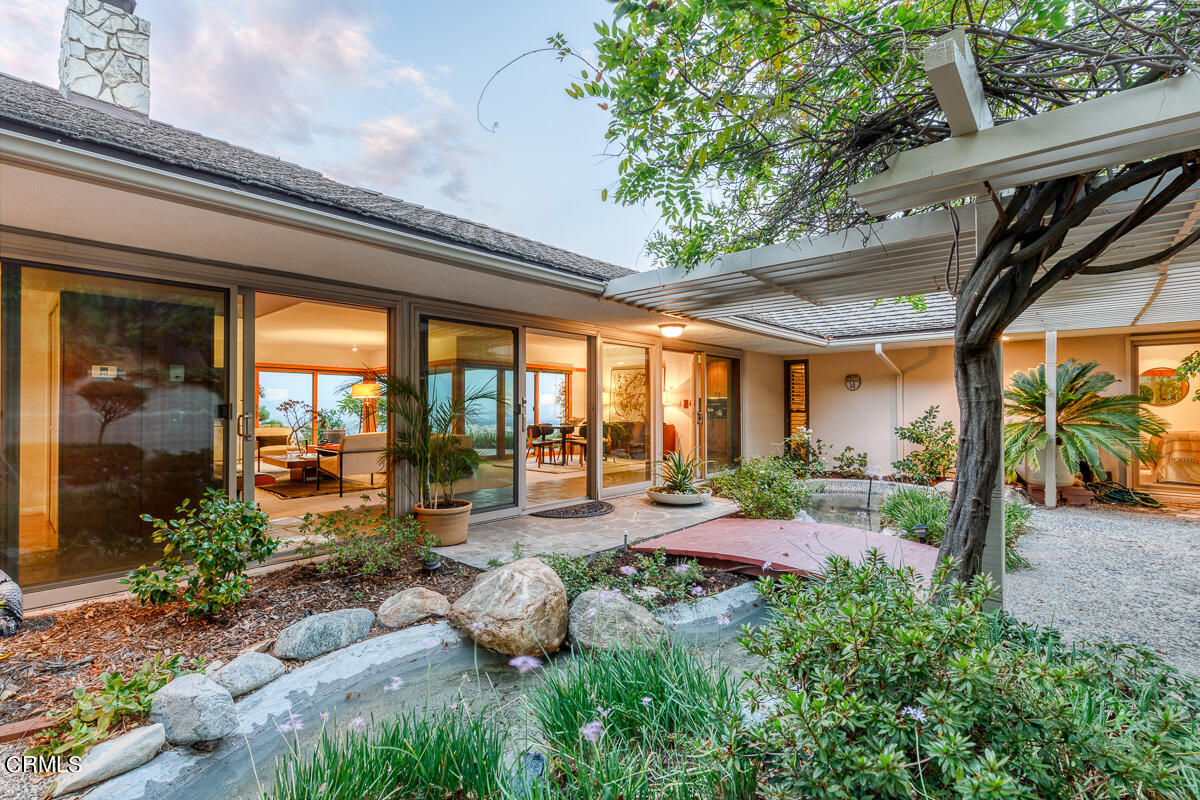 775 Panorama Place Pasadena, CA 91105 - Photo 54 of 62 a backyard of a house with a garden and outdoor seating