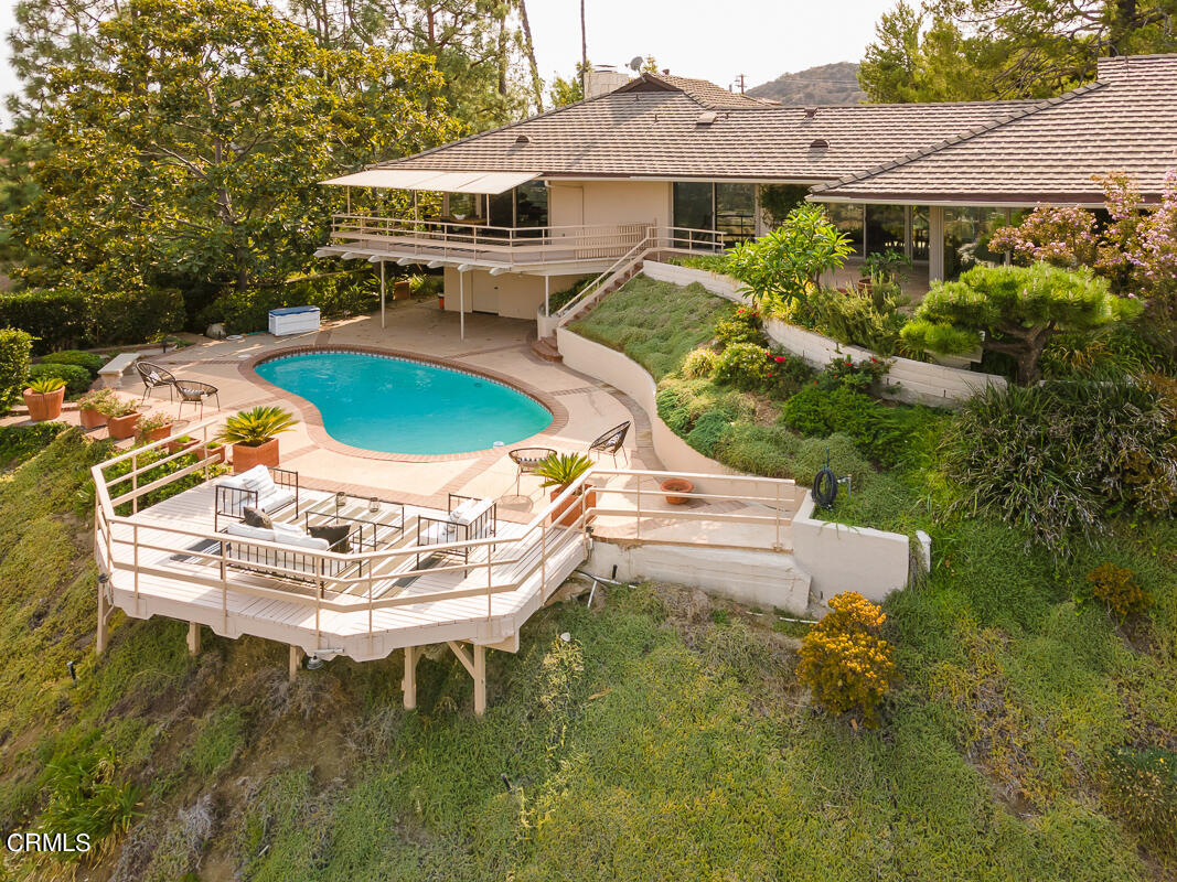 775 Panorama Place Pasadena, CA 91105 - Photo 57 of 62 a balcony with table and chairs