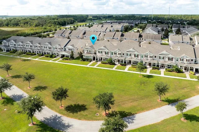 a view of a lake with a yard