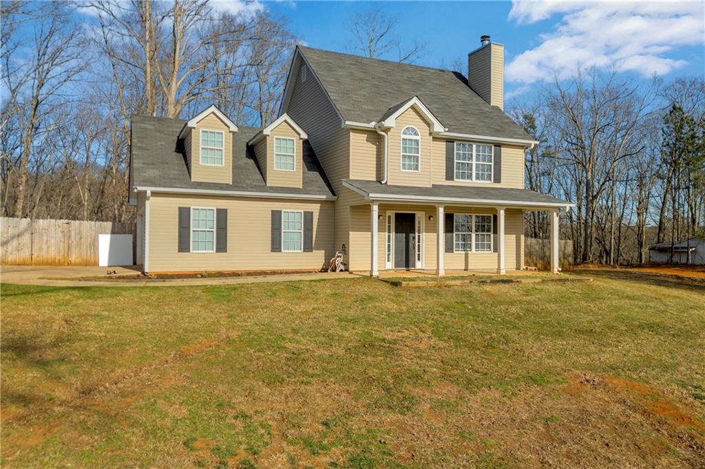 3455 Navigator Lane Gainesville, GA 30507 - Photo 1 of 19 a front view of a house with a garden