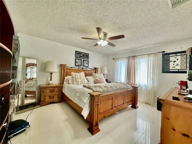 a bed room with a bed and a couch