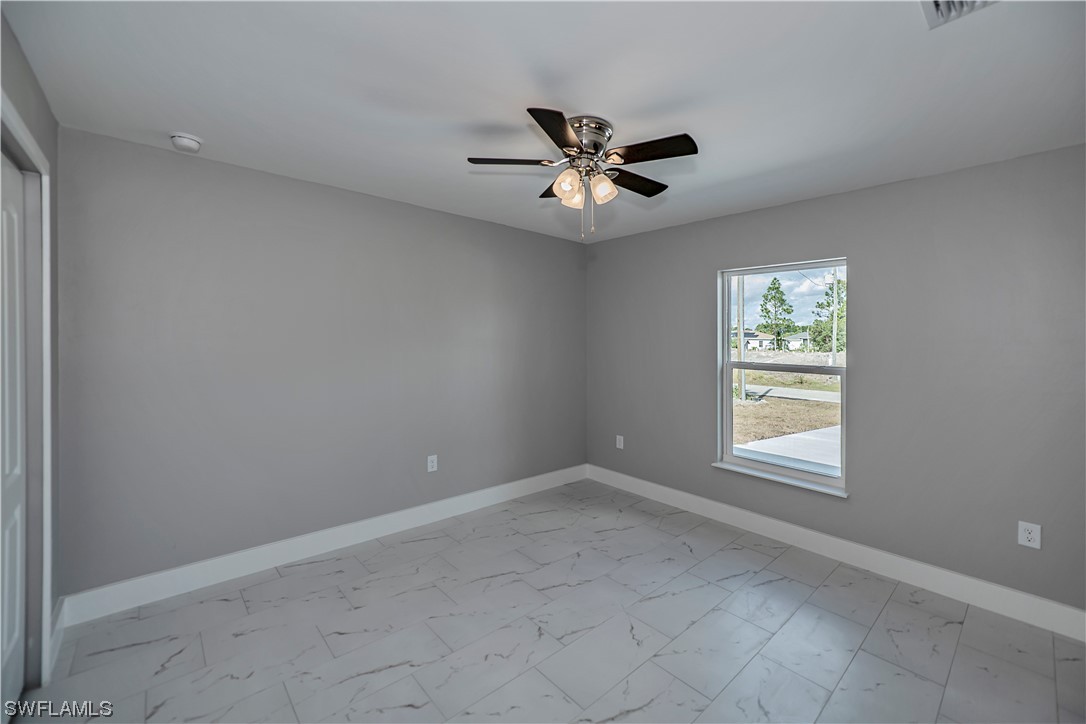 9035 West Crow Circle LaBelle, FL 33935 - Photo 29 of 32 a view of a big room with carpet