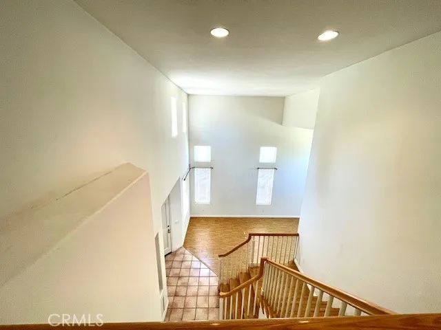 a view of a hallway with staircase