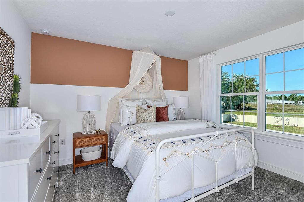 1844 Groveline Road St. Cloud, FL 34771 - Photo 12 of 44 Model Home Design Only. Pictures and furnishings are for illustrative purposes only. Elevations, colors and options may vary. Furniture is for model home staging only.