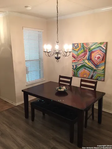 a view of a workspace with furniture