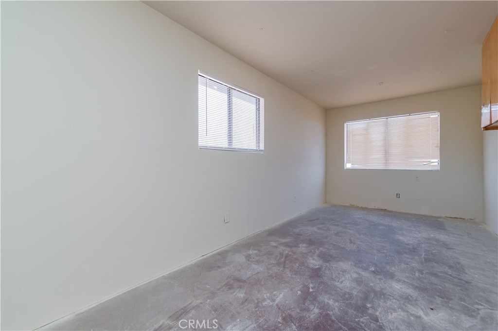 1181 Barkley Ranch Road Pinon Hills, CA 92372 - Photo 28 of 37 an empty room with a window