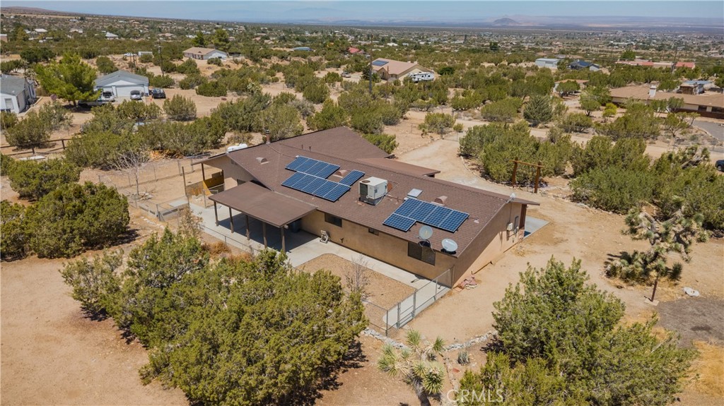 1181 Barkley Ranch Road Pinon Hills, CA 92372 - Photo 5 of 37 an aerial view of residential houses with outdoor space