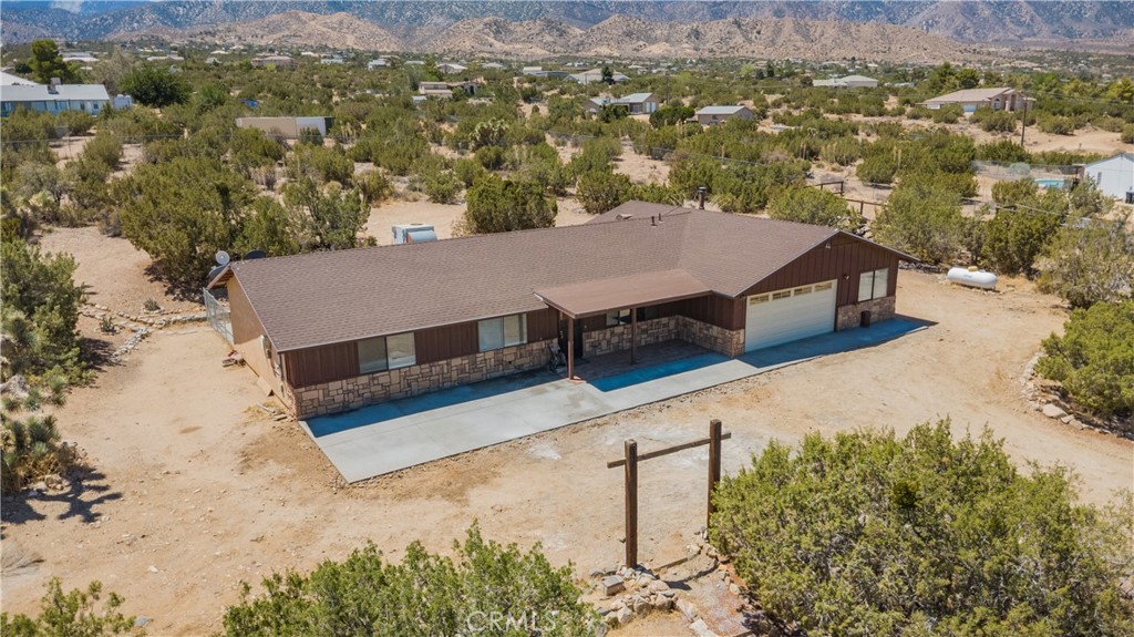 1181 Barkley Ranch Road Pinon Hills, CA 92372 - Photo 6 of 37 a view of a terrace with a mountain