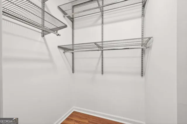 a view of small space with racks on the wall