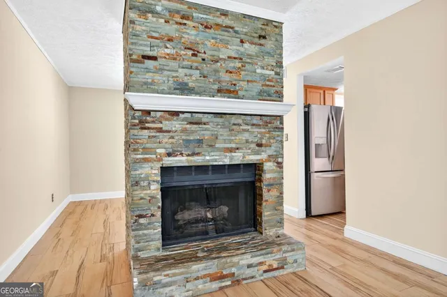 a living room with a fireplace