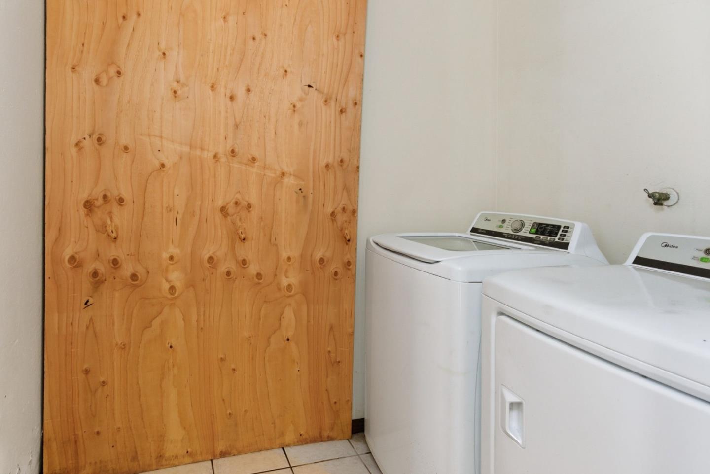 1460 Mescal Street Seaside, CA 93955 - Photo 19 of 24 a utility room with dryer and washer