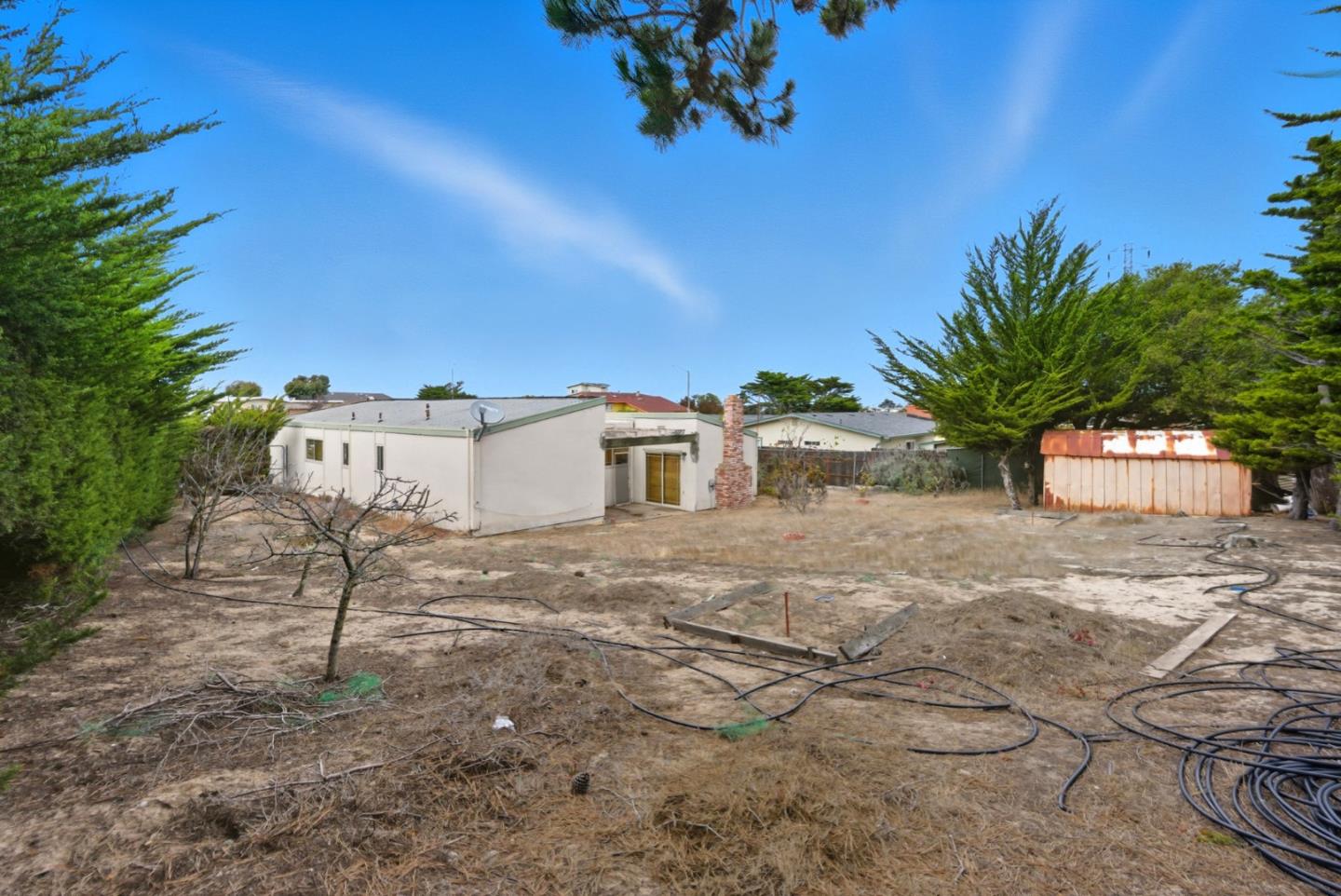 1460 Mescal Street Seaside, CA 93955 - Photo 22 of 24 a view of a street with a building in the background