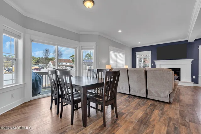 a living room with furniture or couch and a fireplace