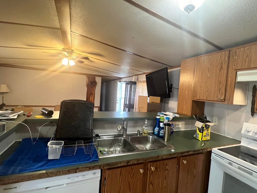 1148 Keith Valley Road Southeast Cleveland, TN 37323 - Photo 15 of 39 a kitchen with a sink appliances and cabinets