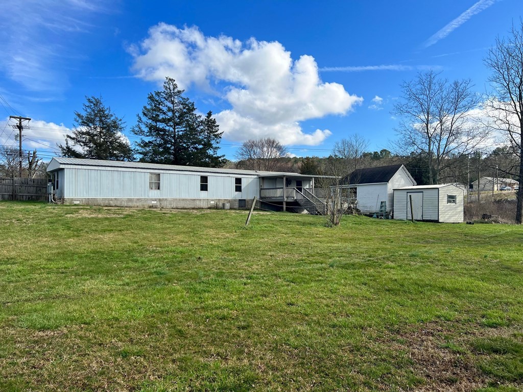 1148 Keith Valley Road Southeast Cleveland, TN 37323 - Photo 28 of 39 a view of house with garden and trees