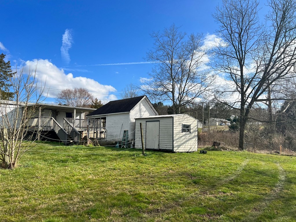 1148 Keith Valley Road Southeast Cleveland, TN 37323 - Photo 39 of 39 a view of a house with a yard