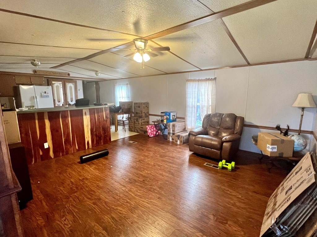 1148 Keith Valley Road Southeast Cleveland, TN 37323 - Photo 4 of 39 a living room with furniture and a wooden floor