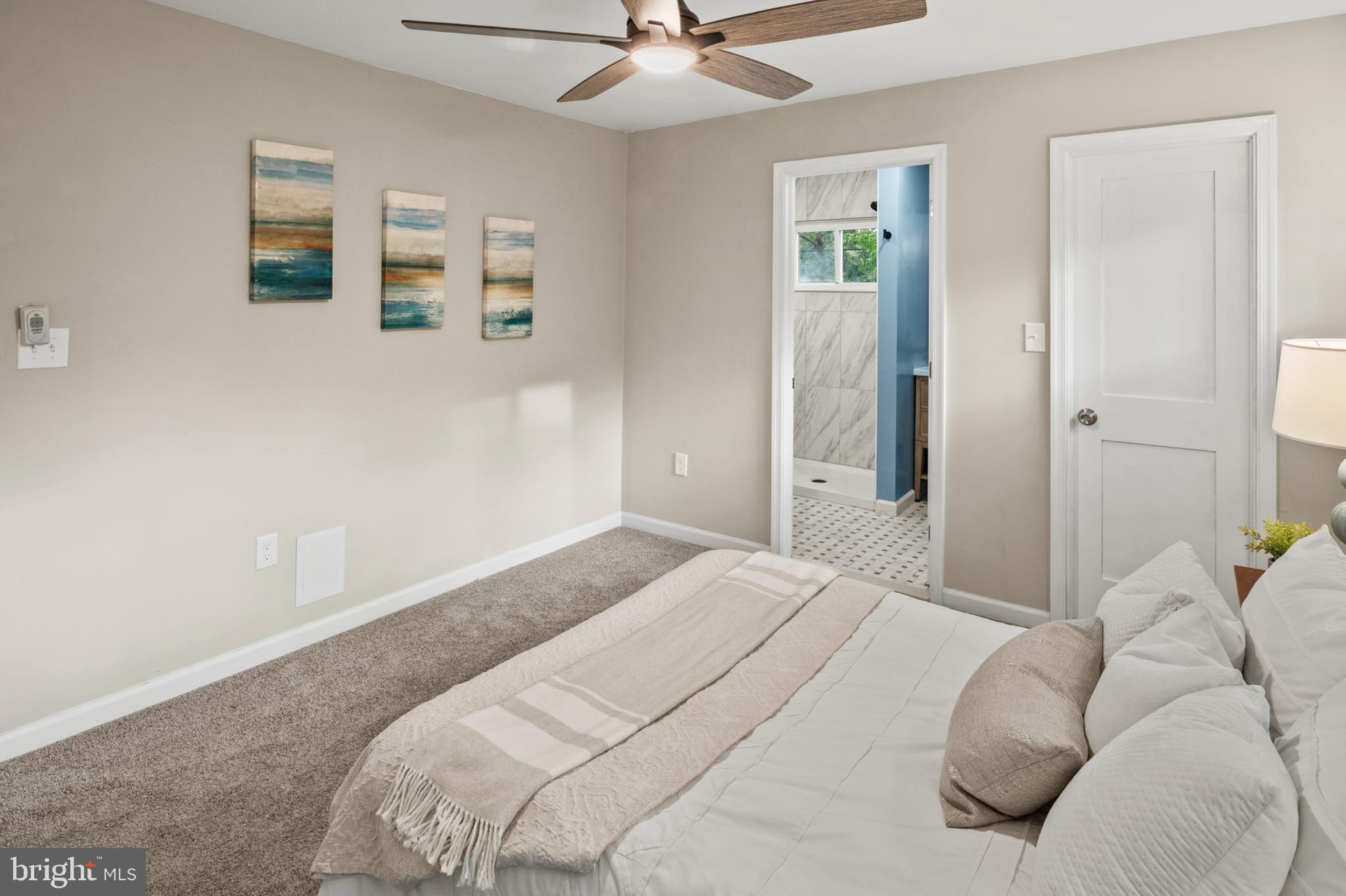 7966 Foster Avenue Severn, MD 21144 - Photo 12 of 25 a bedroom with a bed and window