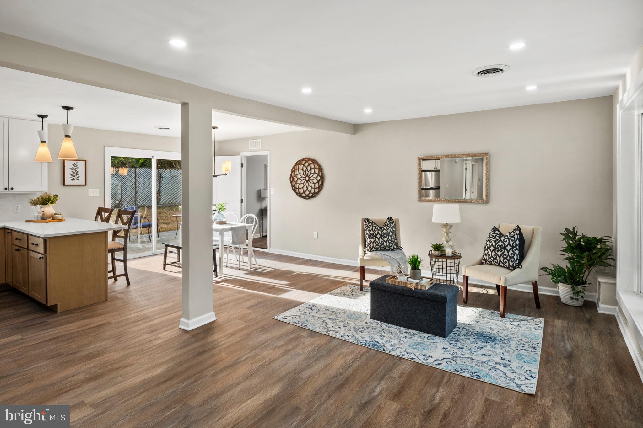 7966 Foster Avenue Severn, MD 21144 - Photo 4 of 25 a living room with furniture and wooden floor