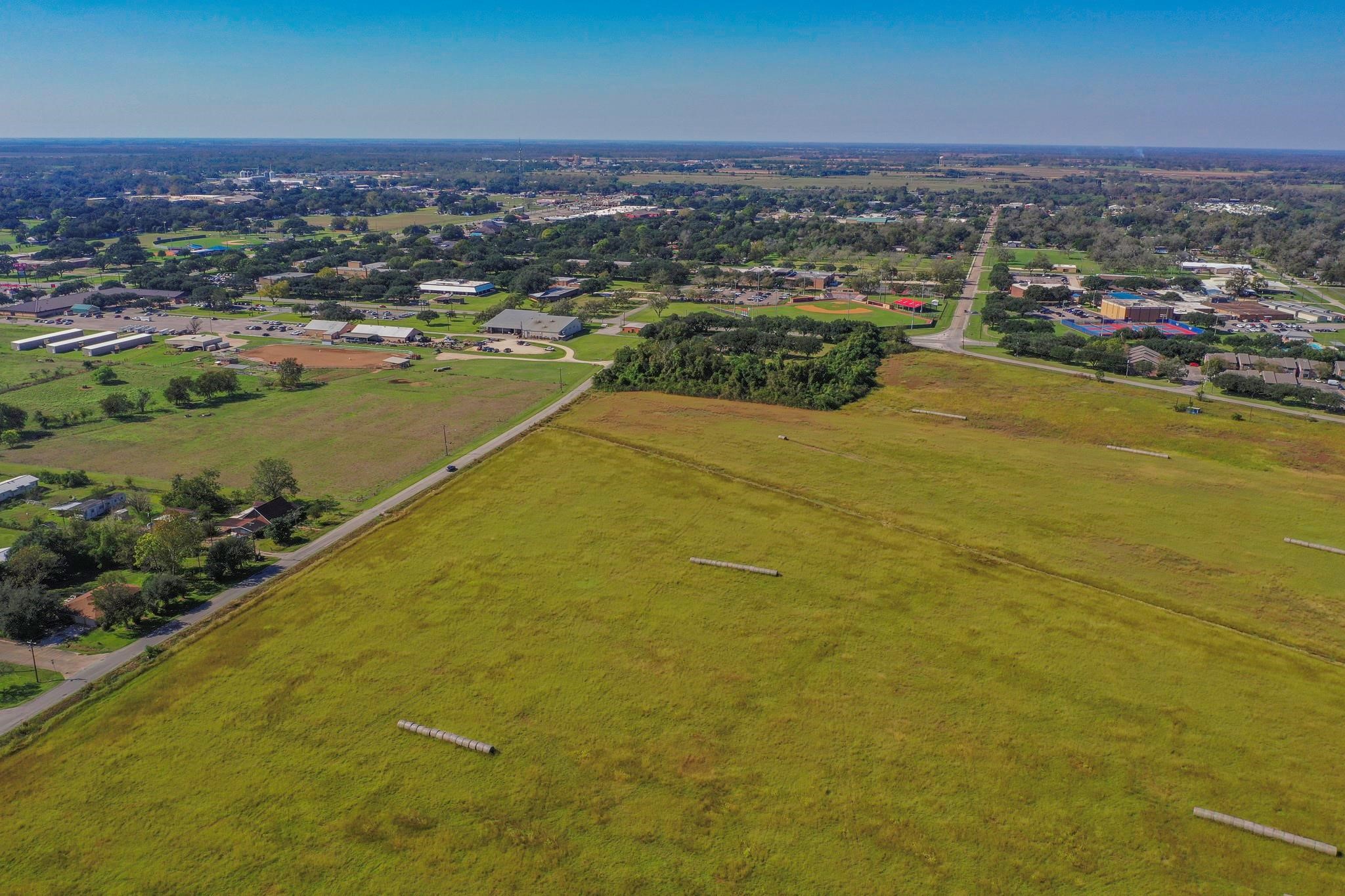 2320 County Road 166 Wharton, TX 77488 - Photo 19 of 22 an aerial view of residential houses with outdoor space