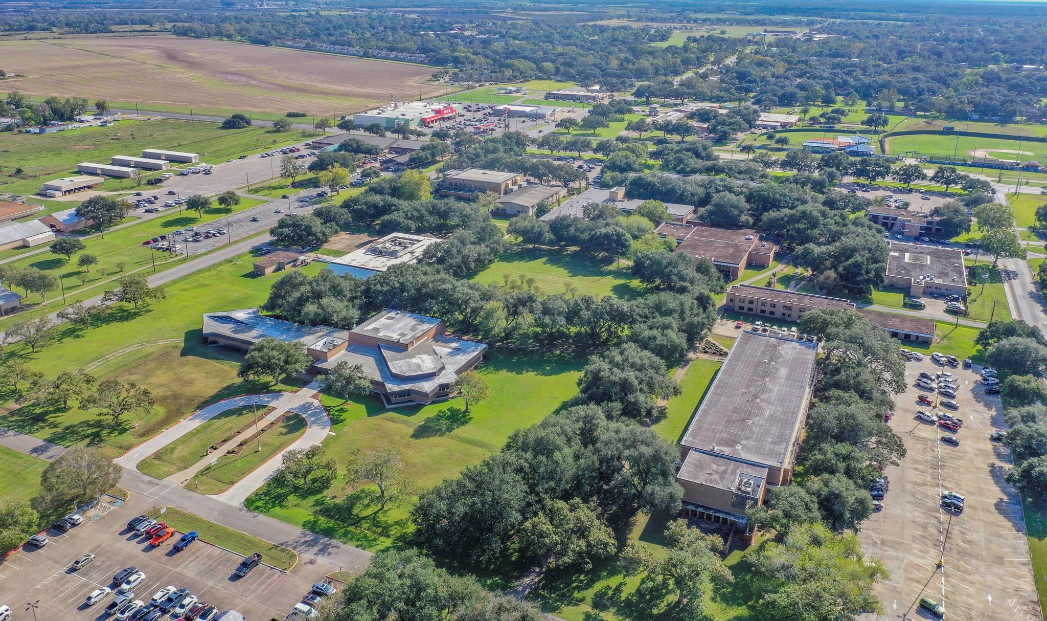 2320 County Road 166 Wharton, TX 77488 - Photo 5 of 22 an aerial view of a house with a swimming pool