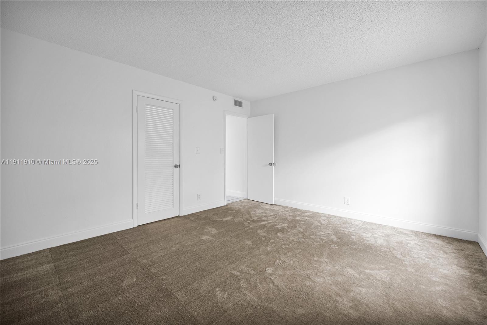 7550 Stirling Road, Unit C406 Davie, FL 33024 - Photo 13 of 27 a view of empty room