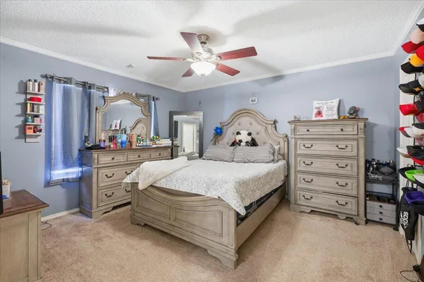 a bedroom with a bed and a closet